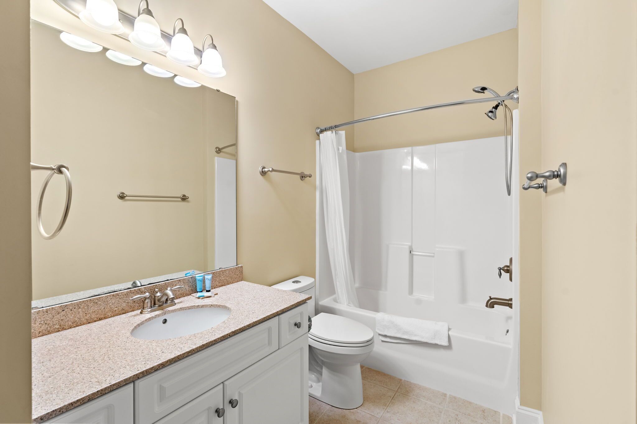 Ducha, toallas y champú