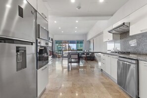 Microwave, cookware/dishes/utensils, spices, cleaning supplies - Deck 12 Vallarta Residences (Puerto Vallarta)