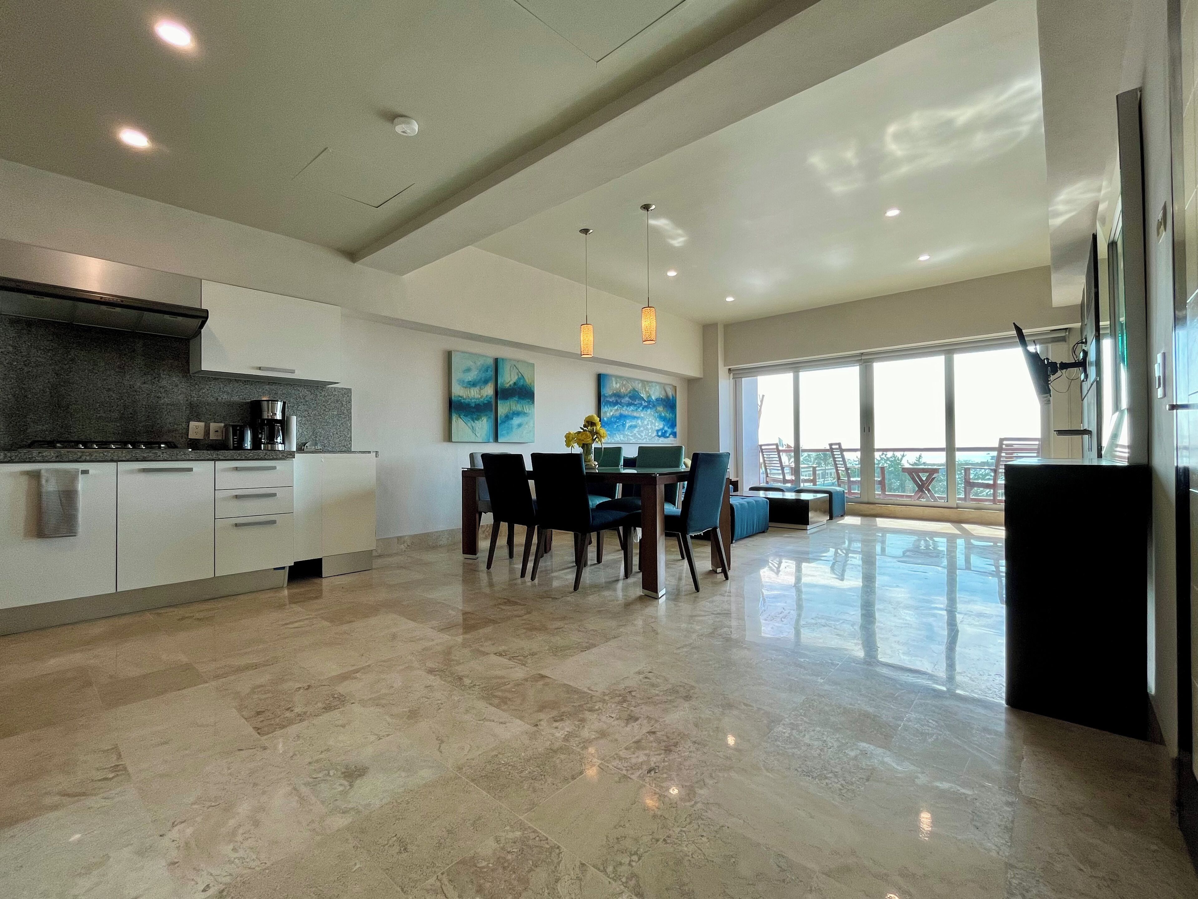 Deluxe Apartment | Living area | 50-inch LED TV with digital channels