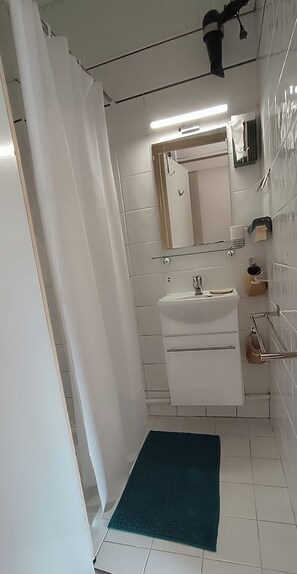 Shower, eco-friendly toiletries, hair dryer, soap