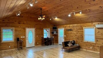 Télévision, cheminée, chaîne hi-fi