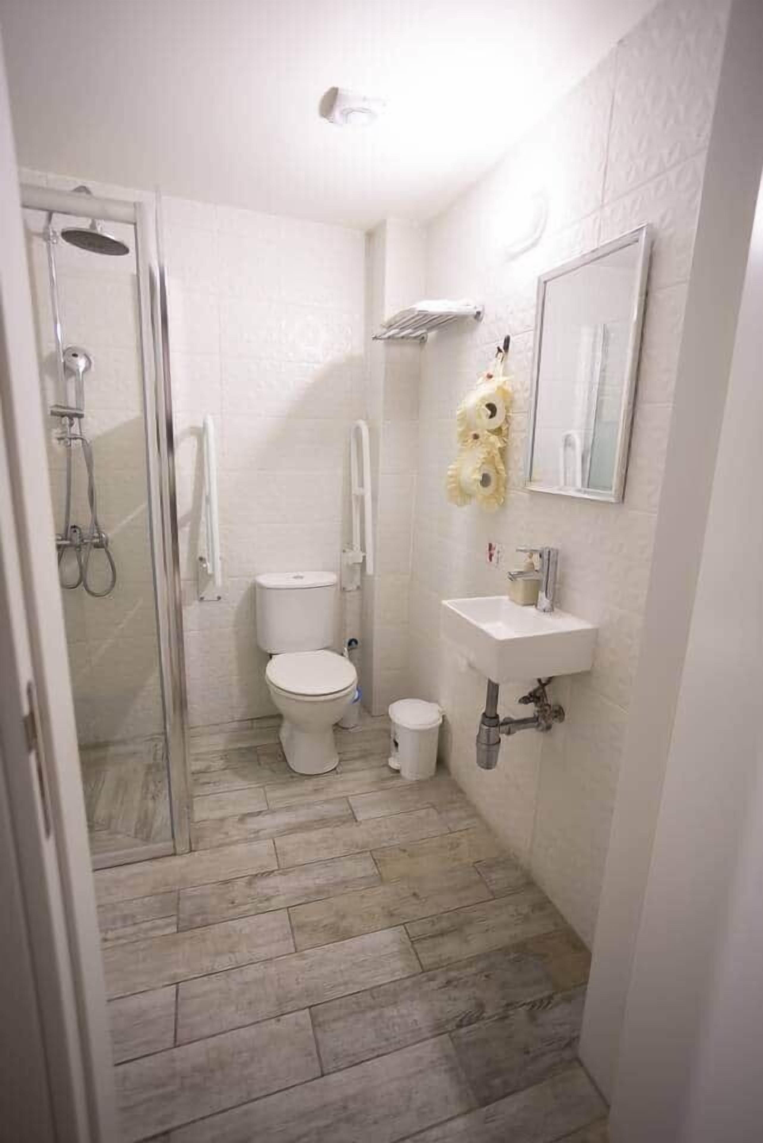 Hair dryer, towels, soap, toilet paper