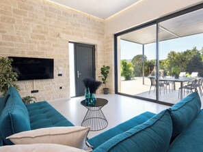 Luxury Villa, Garden View | Living area | 55-inch Smart TV with cable channels - PanStel - Villa Solene with private pool (Chania)
