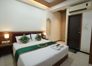 Deluxe Room | Desk, free WiFi, bed sheets - Hotel Royal (Rajkot)