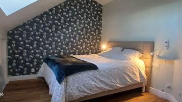 2 dormitorios, tabla de planchar con plancha, wifi gratis y ropa de cama