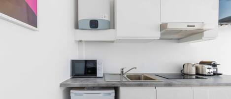 Microwave, stovetop, coffee/tea maker, toaster