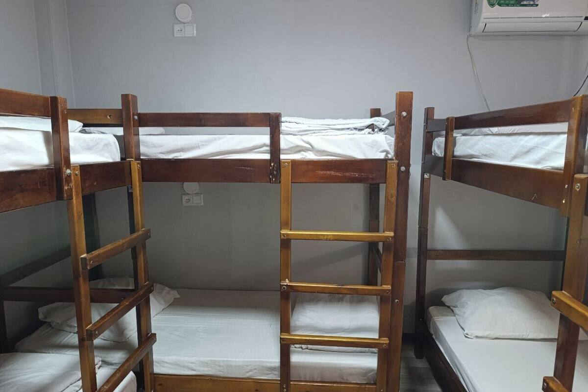 Economy Shared Dormitory, Men only | Blackout drapes, iron/ironing board, free WiFi, bed sheets