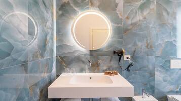 Hair dryer, slippers, towels, soap