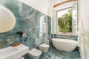 Hair dryer, slippers, towels, soap