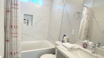 Hair dryer, towels, soap, toilet paper