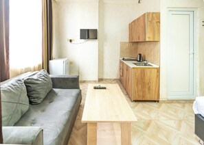 Superior Studio, Balcony | Living area