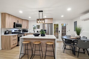 Fridge, microwave, oven, stovetop - Modern 6BR Lynnwood Retreat w/ AC • 2 Full Chef Kitchens • Close to Downtown (Lynnwood)