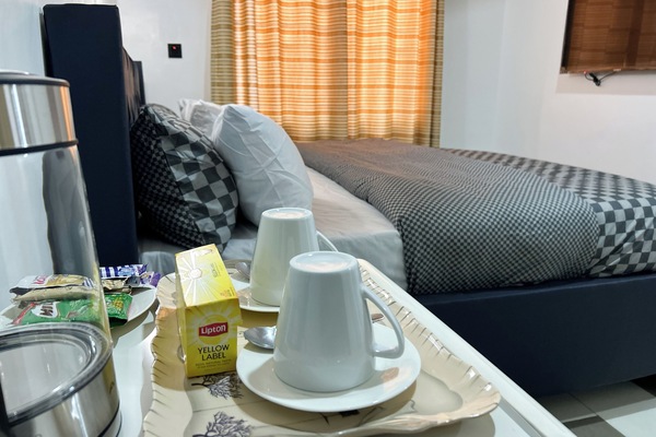 Deluxe Room | Iron/ironing board, free WiFi