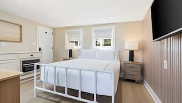 Suite Premier, 1 cama Queen size, vista al patio | Wifi gratis y ropa de cama