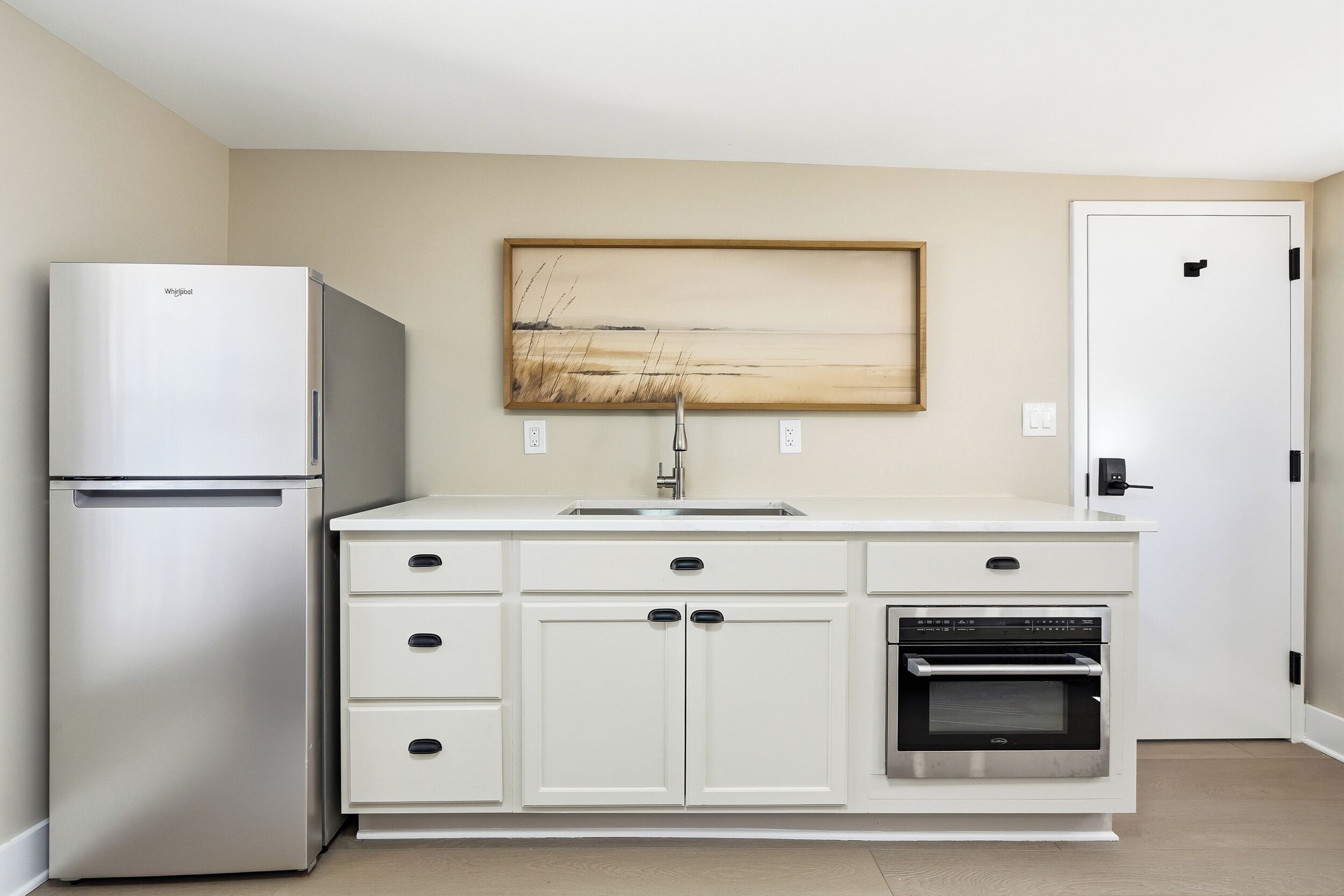 Suite « Premier », 1 grand lit, vue cour intérieure | Coin cuisine privé | Chaise haute