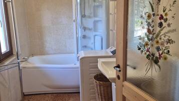 Shower, jetted tub, hair dryer, bidet