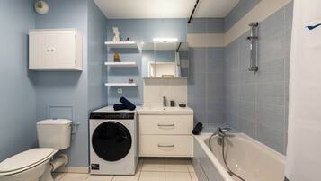 Hair dryer, towels, soap, toilet paper