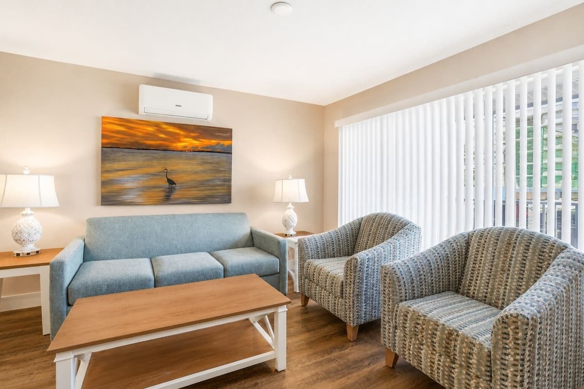 Standard Condo, 1 Bedroom, Courtyard View | Living area | 32-inch flat-screen TV with cable channels