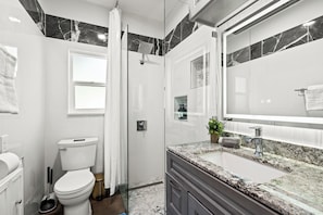 Shower, hair dryer, towels, soap