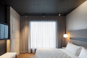 Habitación estándar, 1 cama de matrimonio grande | Escritorio, cortinas opacas, sistema de insonorización