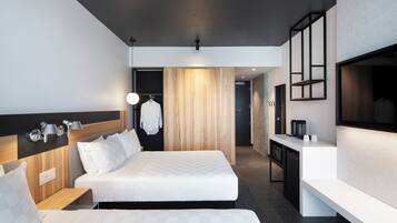 Habitación estándar doble, 2 camas de matrimonio | Escritorio, cortinas opacas, sistema de insonorización