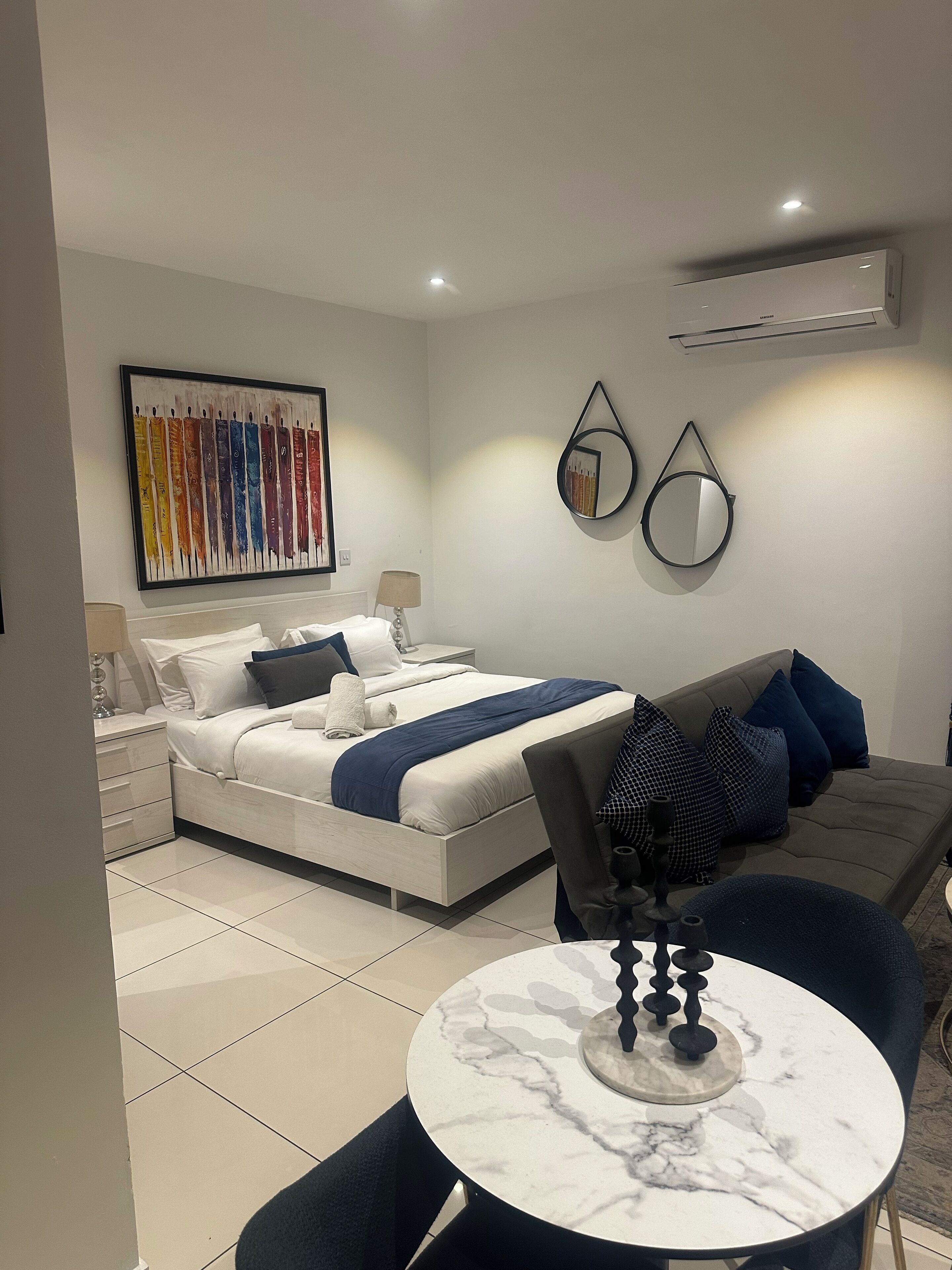 Deluxe Studio Suite, 1 Queen Bed, Pets Allowed, Garden View | Memory foam beds, desk, laptop workspace, free WiFi