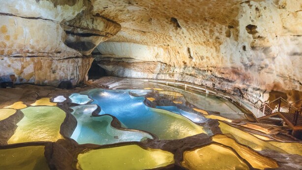 A cave interior with stalactites and a pool of mineral water. - Amazing home in Lussan (Lussan)