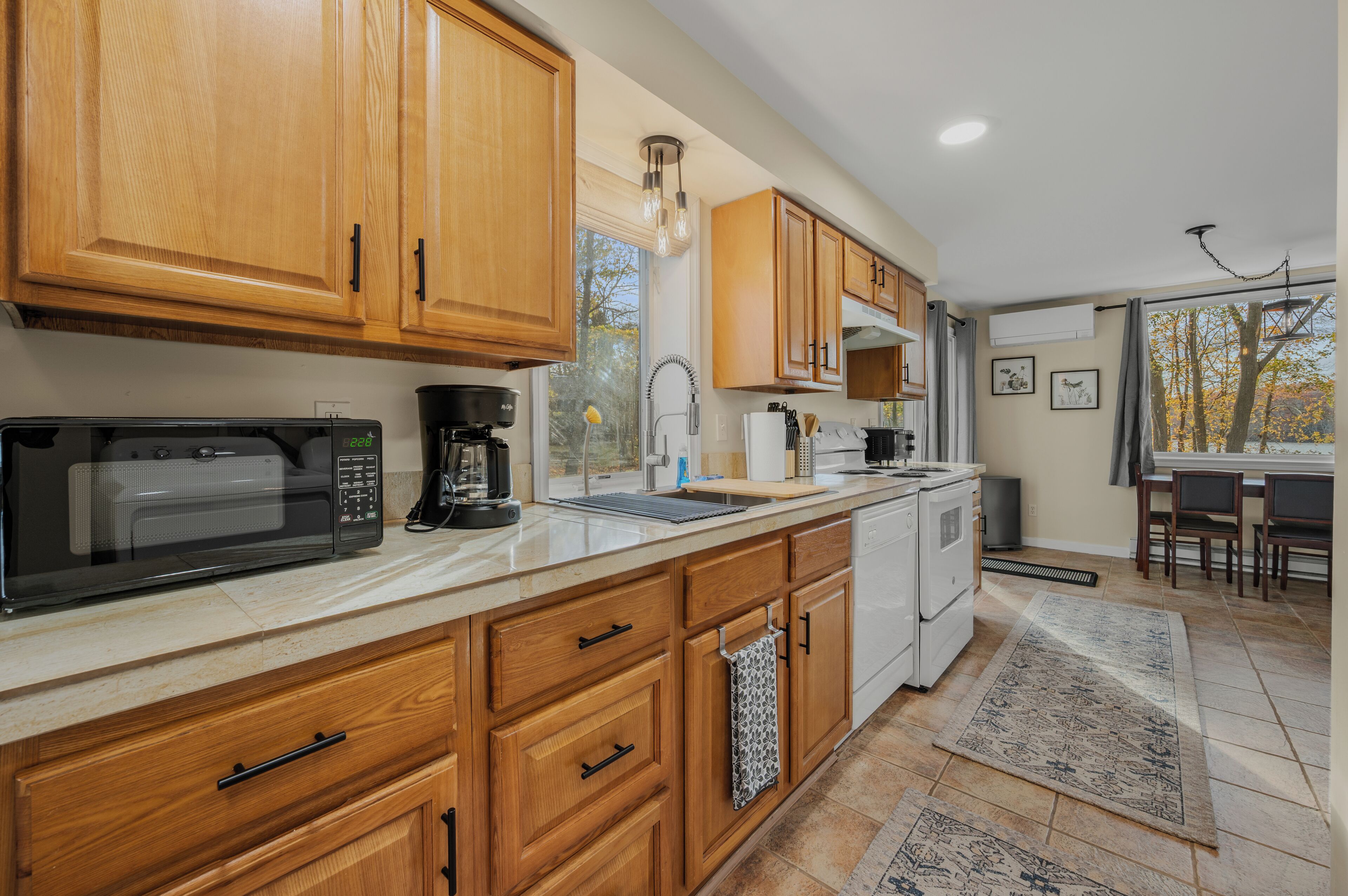 Coffee/tea maker, fridge, microwave, oven