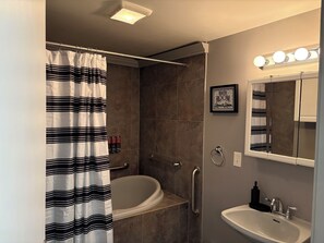 Shower, jetted bath, towels, soap - Newly remodeled spacious 3Bd Handicap Accessible home, near Downtown & I-70  (Topeka)