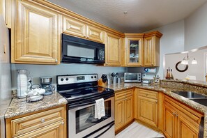 Fridge, microwave, oven, stovetop - Sunset Cove Haven — Spacious Condo with Balcony, Unheated Pool & Hot Tub! 🌞 (Melbourne)