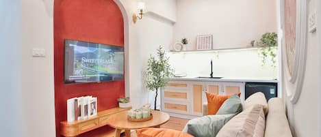 Premium Studio, City View | Living area | 50-inch flat-screen TV with satellite channels, Netflix