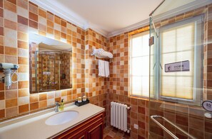 Shower, free toiletries, hair dryer, towels