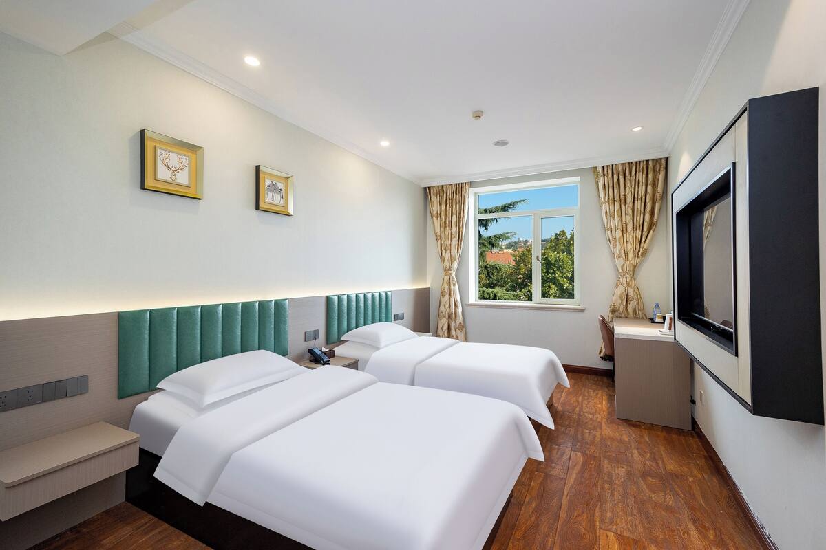 Habitación estándar con 2 camas individuales, Aire acondicionado, vistas al patio | Escritorio, espacio para trabajar con un portátil, wifi gratis