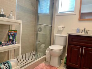 Hair dryer, towels, soap, toilet paper