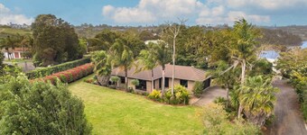 Riverside paradise with jetty and garden