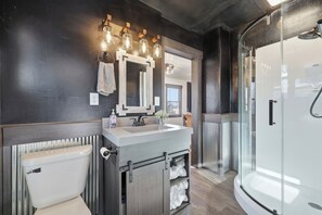 Jetted bath, hair dryer, towels, soap