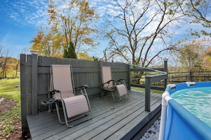 A wooden deck with lounge chairs and a hot tub. - The Nook on the Farm—Pool • Hot Tub • Games (Pataskala)