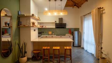 Fridge, microwave, stovetop, coffee/tea maker