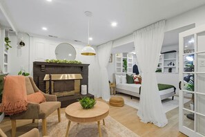 Smart TV, fireplace, books