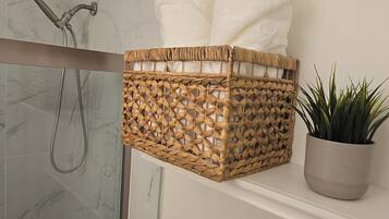 Hair dryer, towels, soap, shampoo