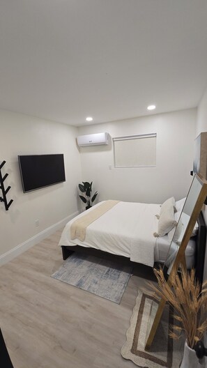 1 slaapkamer, een strijkplank/strijkijzer, gratis wifi, beddengoed