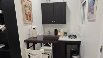 Fridge, microwave, stovetop, coffee/tea maker