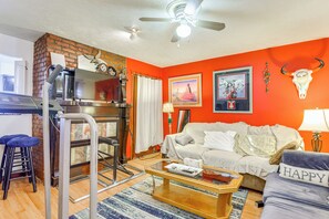 TV, fireplace, books, stereo