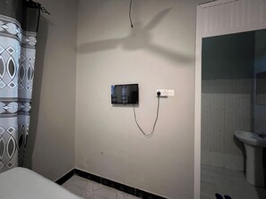 Shower, towels, soap, toilet paper