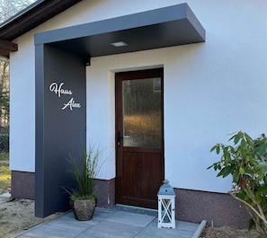 Exterior detail - Relaxing vacation home Waldharmonie in Kölpinsee with sauna, garden and balcony - (Loddin)