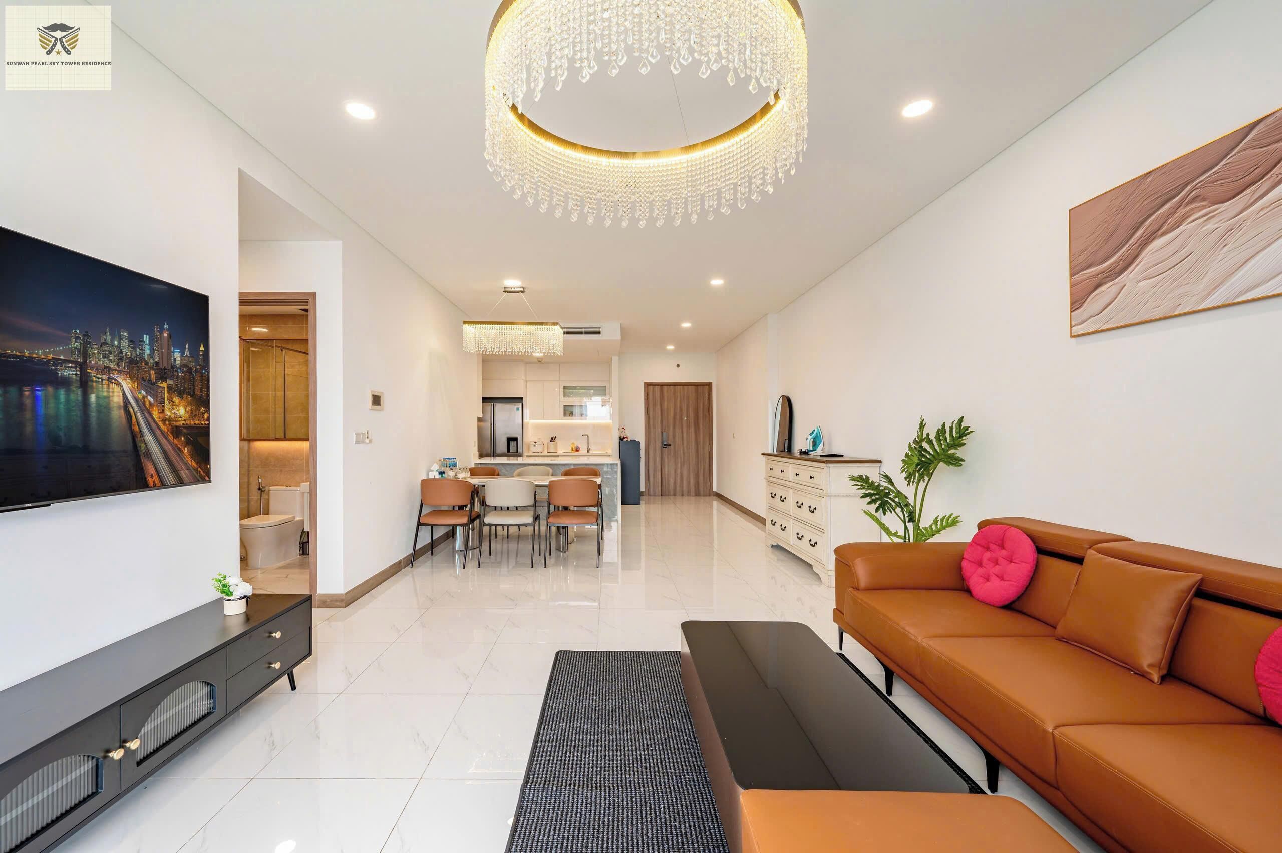 Lyxlägenhet - 3 sovrum - icke-rökare - utsikt mot staden | Vardagsrum | 24-tums tv med digitalkanaler