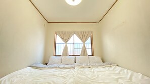 Habitación, varias camas, cocineta, planta baja | Wifi gratis 