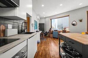 Fridge, microwave, oven, stovetop - Downtown Denver Suite - Skyline Views (Denver)