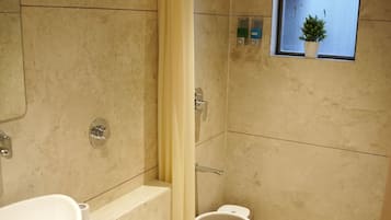 Shower, towels, soap, shampoo