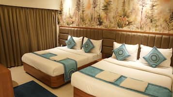 Family Quadruple Room, City View | Desk, soundproofing, free WiFi